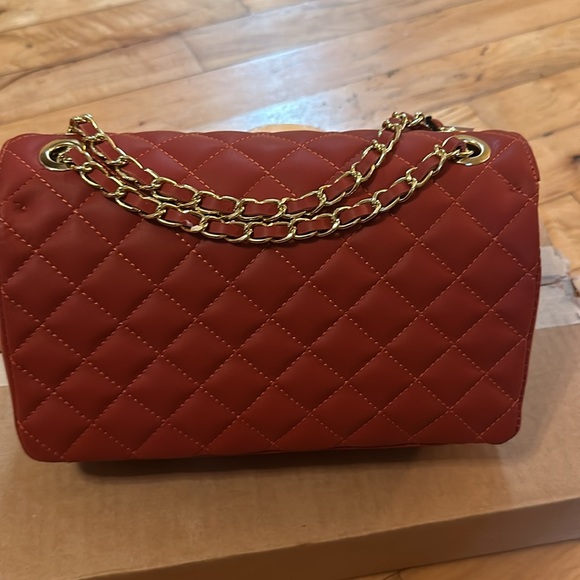 Roberta Rossi leather Quilted xbody turn lock gold chain strap 
Color  Papaya - Picture 3 of 5